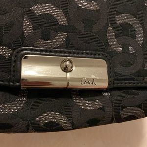 Beautiful COACH Black & Silver Wristlet!
Very good condition!